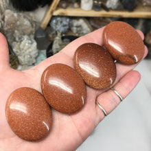 Load image into Gallery viewer, Goldstone Pillow Palm Stones