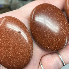Load image into Gallery viewer, Goldstone Pillow Palm Stones