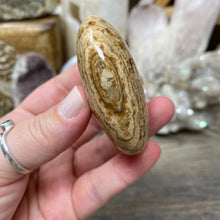 Load image into Gallery viewer, Brown Aragonite Pillow Palm Stone #02
