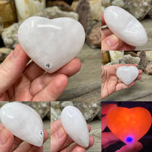 Load image into Gallery viewer, Pink Calcite / Mangano Calcite 2&quot; Heart Palm Stones
