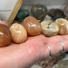 Load image into Gallery viewer, Honey Calcite 1&quot; Tumbles
